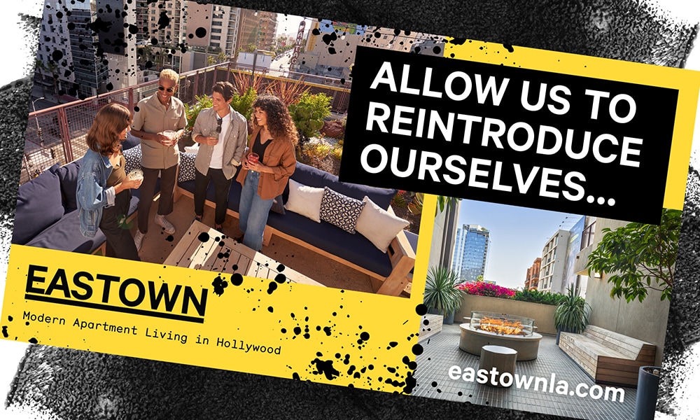 Eastown Postcard against inky background with bright yellow accents